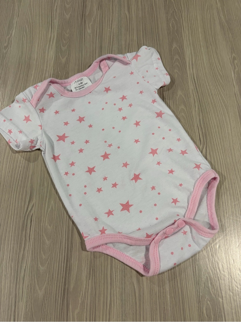 7/$20 Short Sleeve White and Pink One-Piece Short Sleeve Bodysuit with Stars